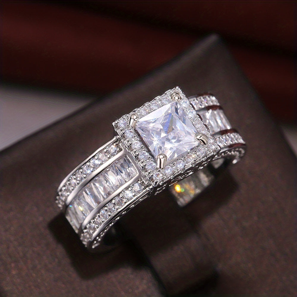 Elegante ring met vierkante zirkonia en radiant slijpsel