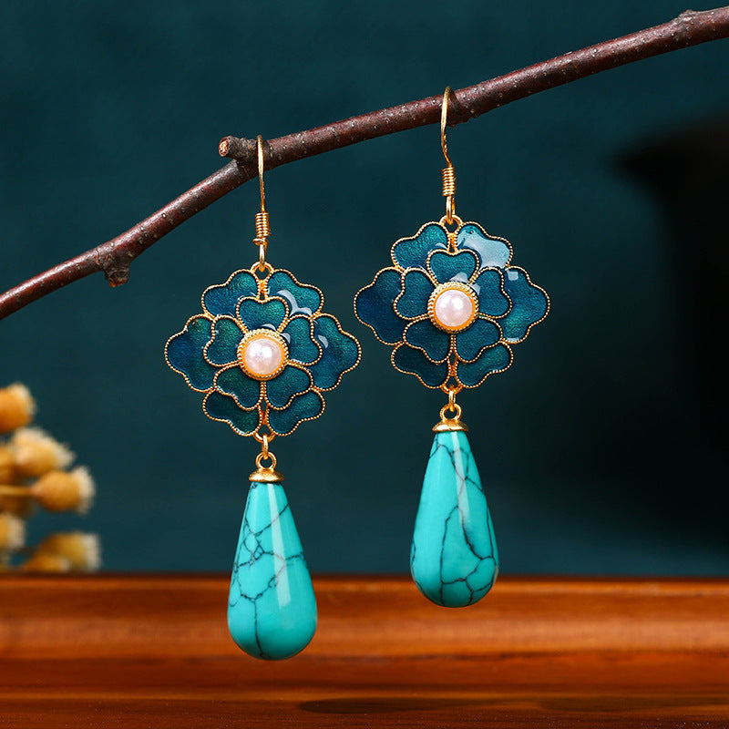 Elegante vintage oorhangers met turkoois bloemmotief en parel