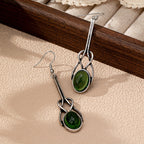 Vintage ambachtelijke oorhangers met rond glas en zinklegering