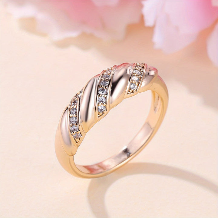 Elegant Zirconia Inlaid Twisted Design Gold Plated Ring