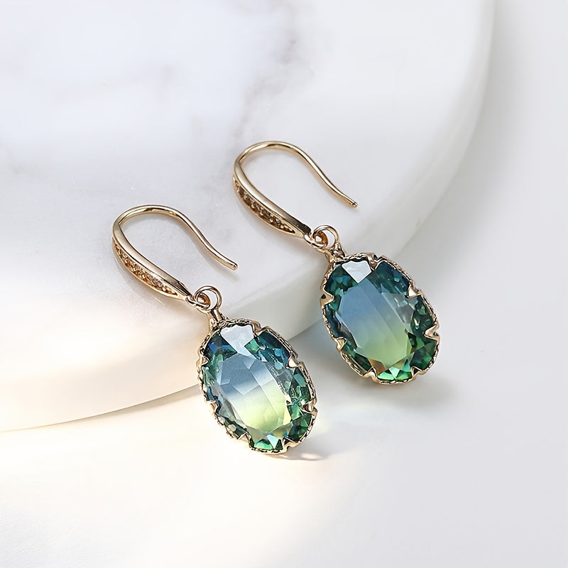Elegante vintage geïnspireerde oorhangers met ovaal groen kristal