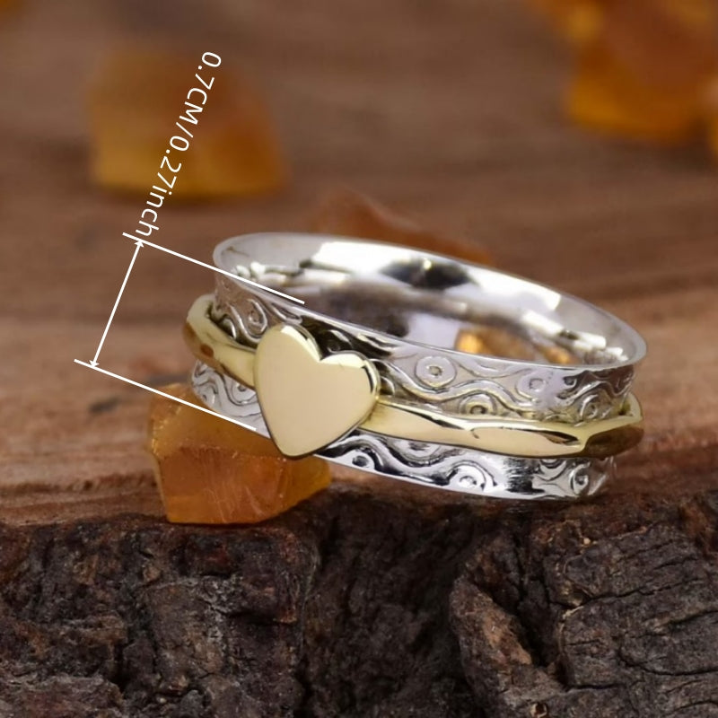 Vintage tweekleurige spinner ring met hartpatroon