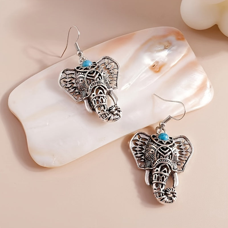 Vintage verzilverde boho olifant oorhangers met turkoois