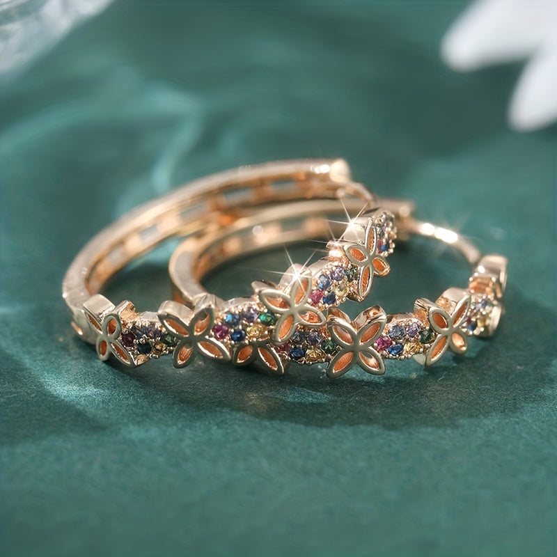 Elegante bohemien oorbellen met meerkleurige zirkonia bloem en vlinder