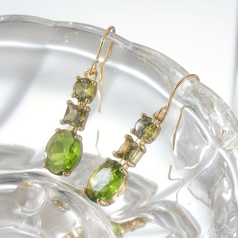 Vintage bohemien geometrische oorbellen met groen zirkonia