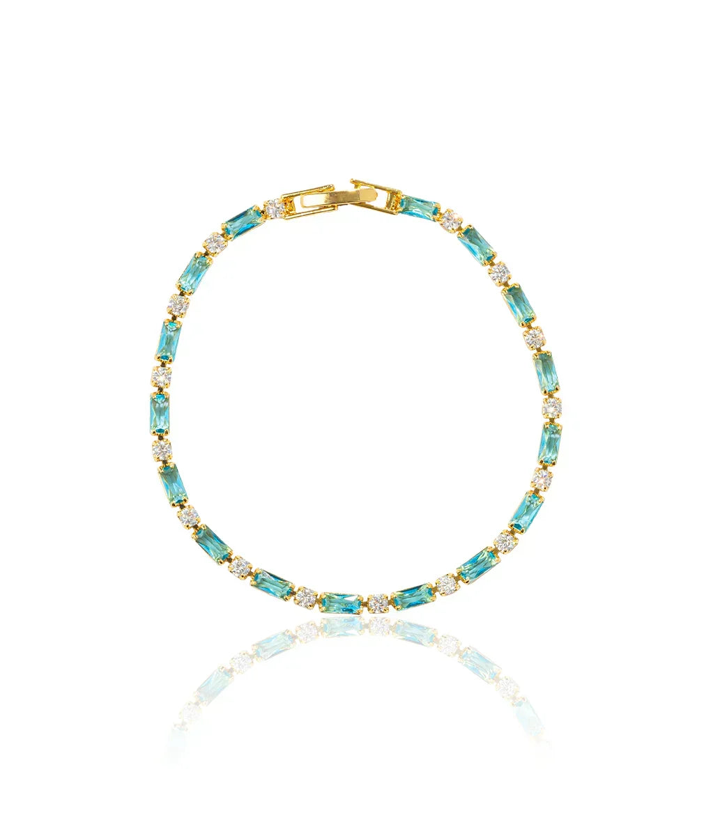 Tijdloze goudkleurige armband met natuurlijk turkoois