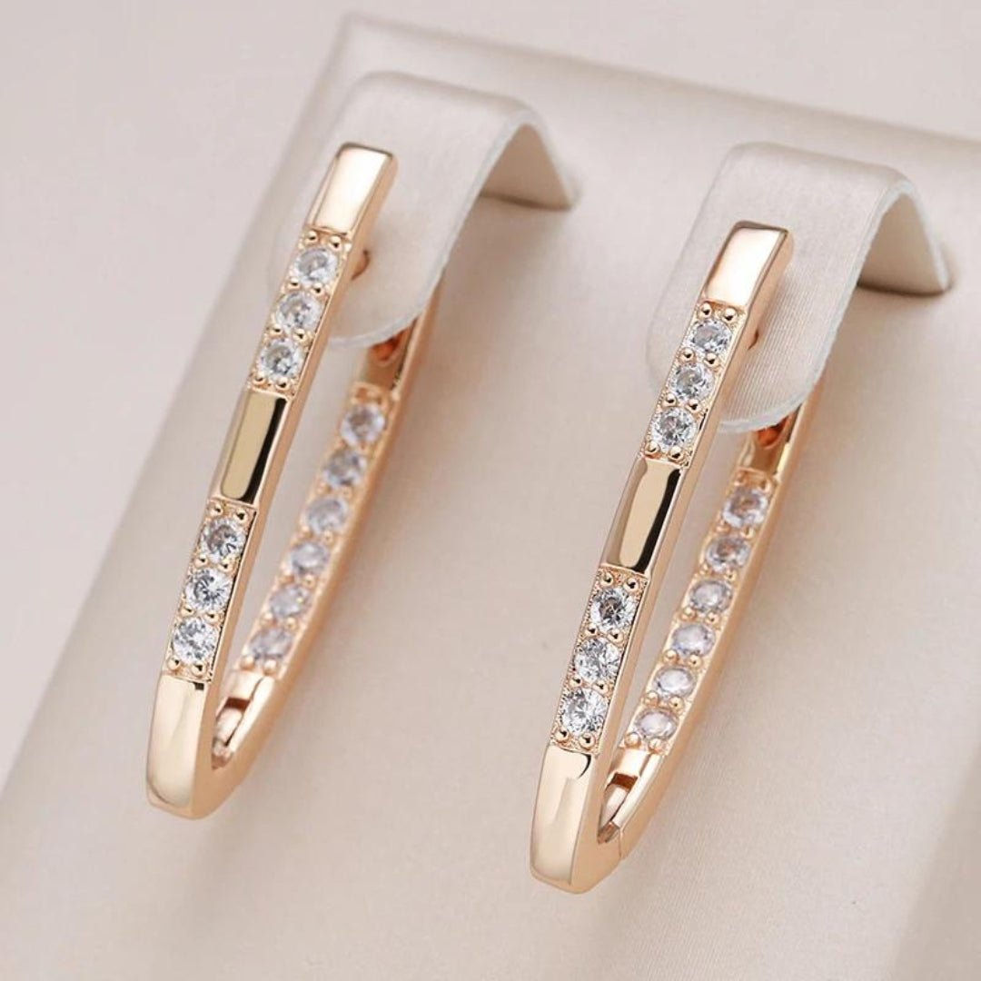 Elegante goudkleurige oorbellen met zirkonia