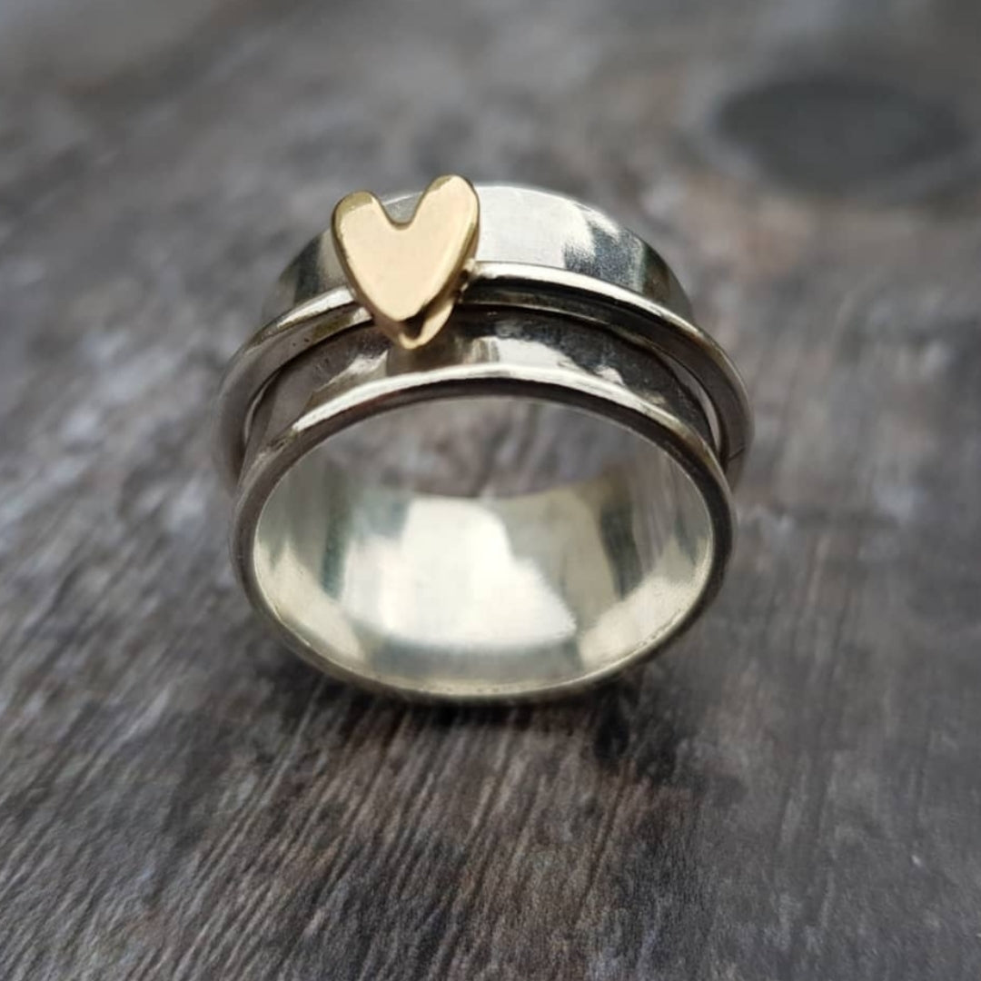 Vintage zilverkleurige ring met goudkleurig hart