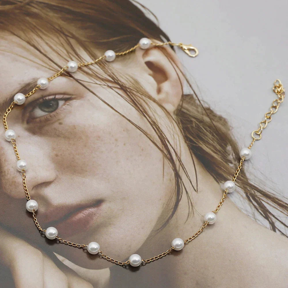 Elegante vergulde ketting met kleine parels