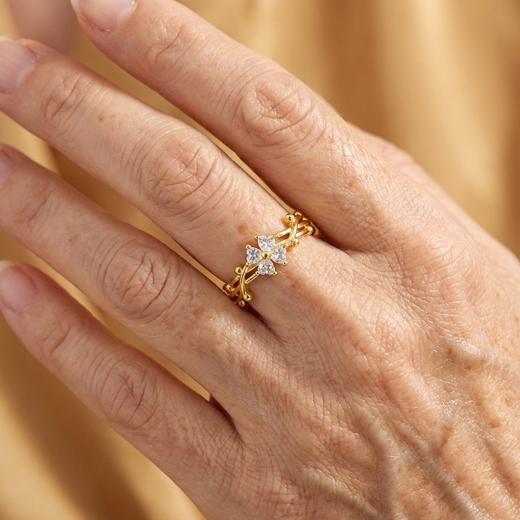 Elegante verstelbare open ring met zirkonia bloem en blad
