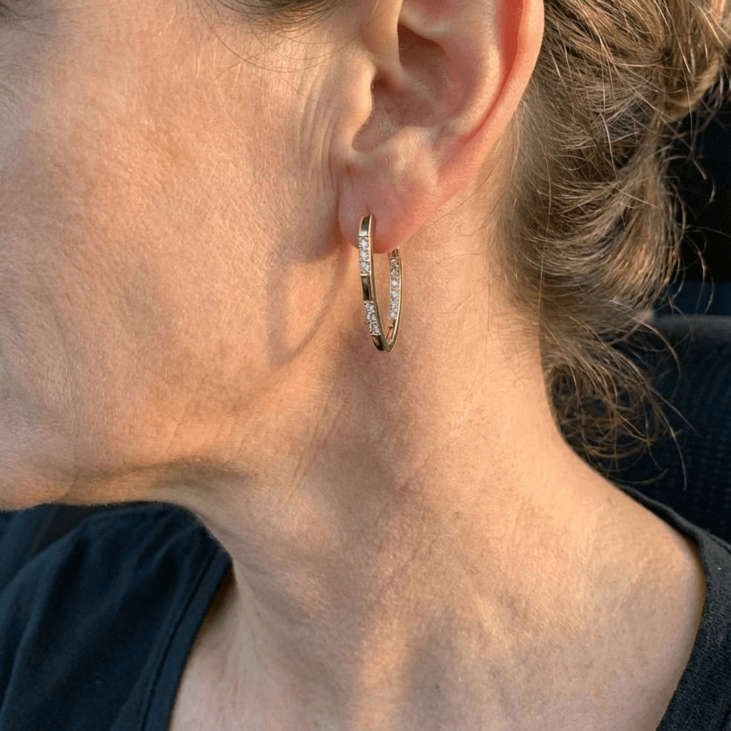 Elegante goudkleurige oorbellen met zirkonia