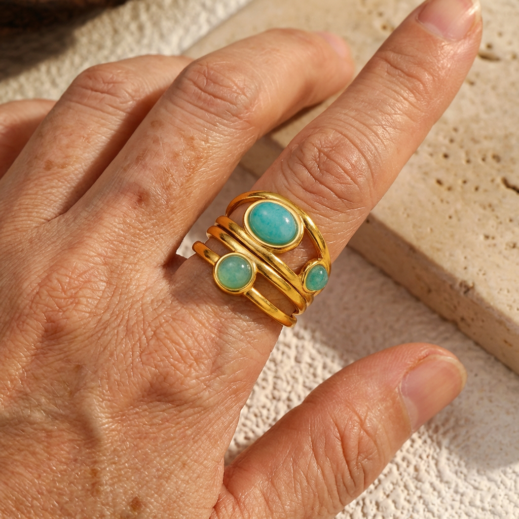 Goudkleurige draad statement ring met dubbele turkoois steen