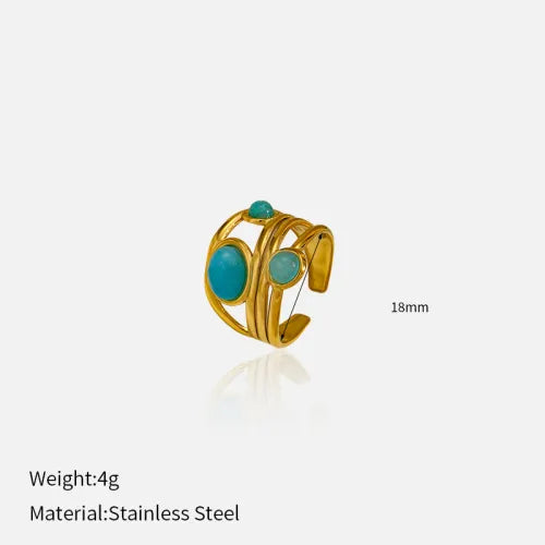 Goudkleurige draad statement ring met dubbele turkoois steen