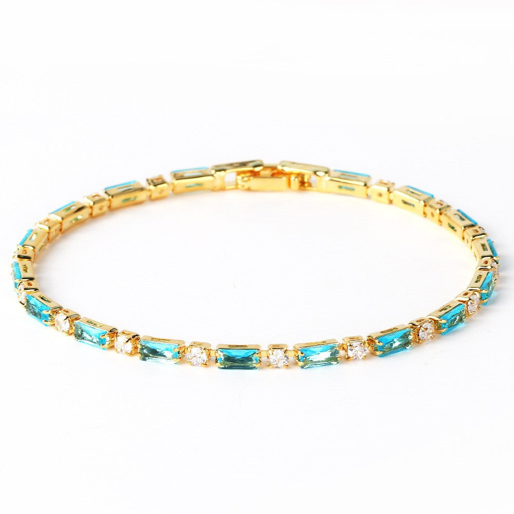 Tijdloze goudkleurige armband met natuurlijk turkoois