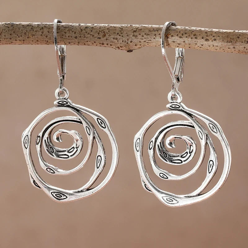 Sculpturale spiraal sterling zilveren oorhangers