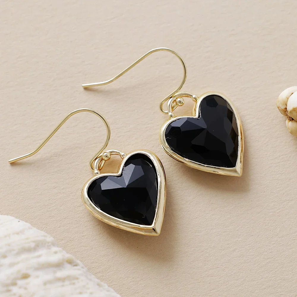 Elegante vergulde oorbellen met liefdesband