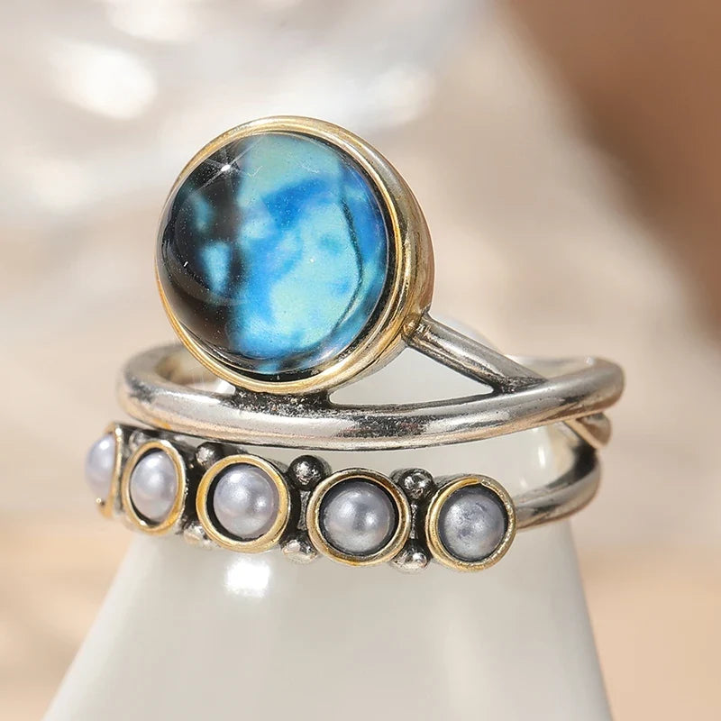 Oceaanblauwe abalone en parel stapelring