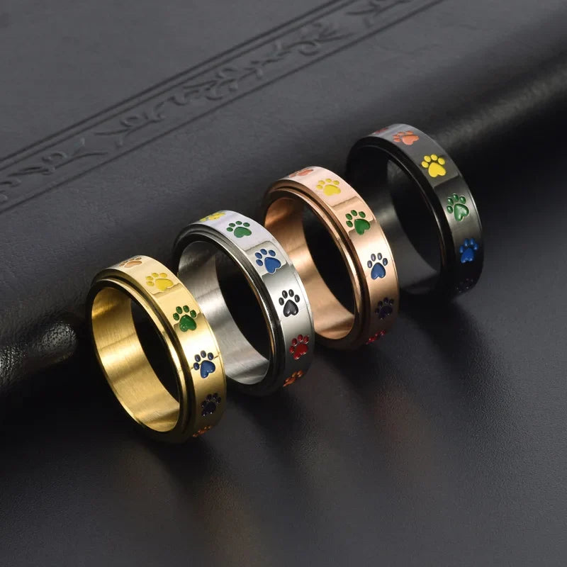 Thea - draaibare antistress-ring met regenboogpootjes