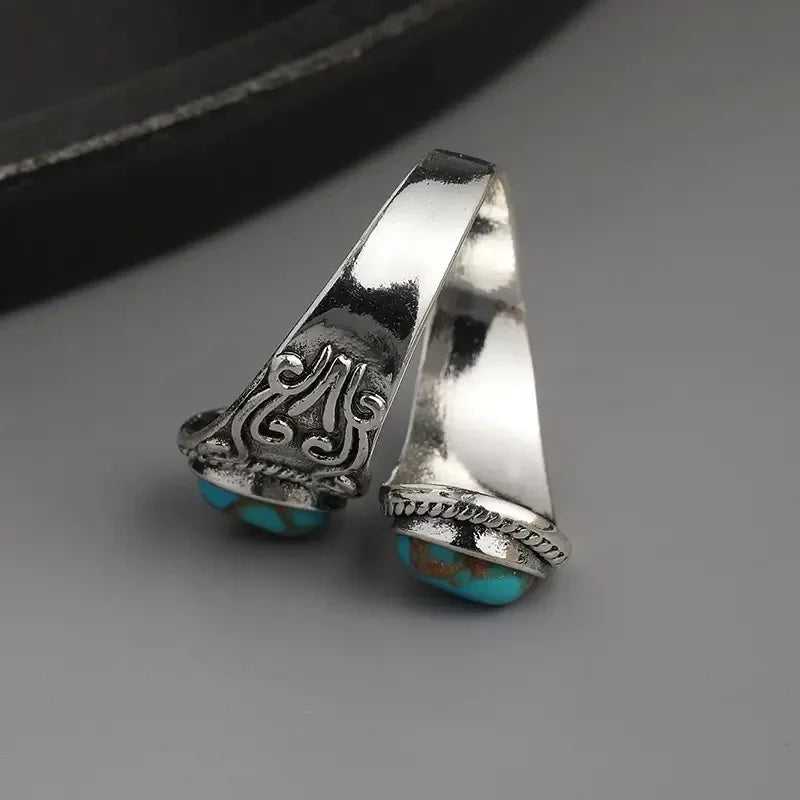 Elegante vintage turkooizen ring met kruisband