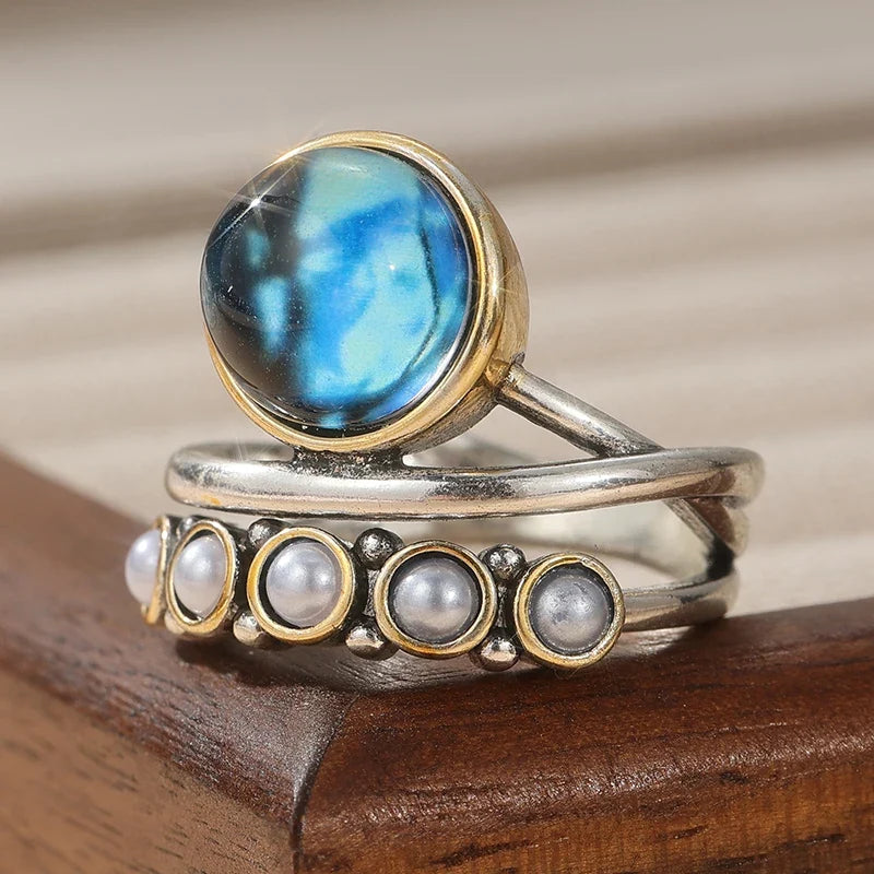 Oceaanblauwe abalone en parel stapelring