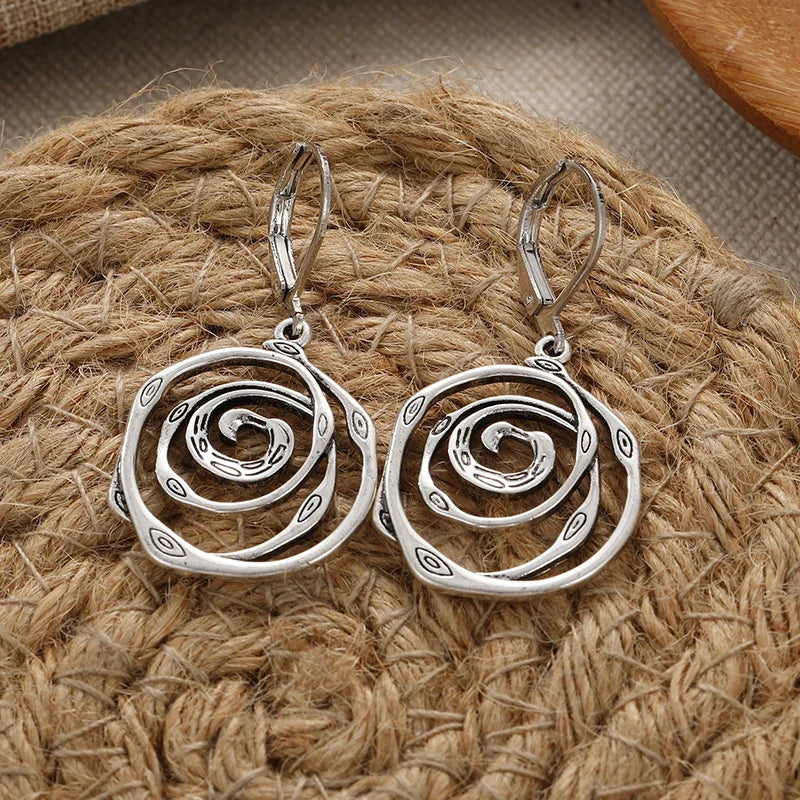 Sculpturale spiraal sterling zilveren oorhangers