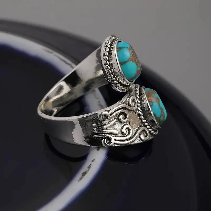 Elegante vintage turkooizen ring met kruisband