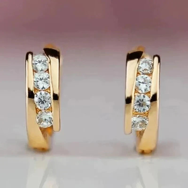 Goudkleurige elegante oorbellen met zirkonia
