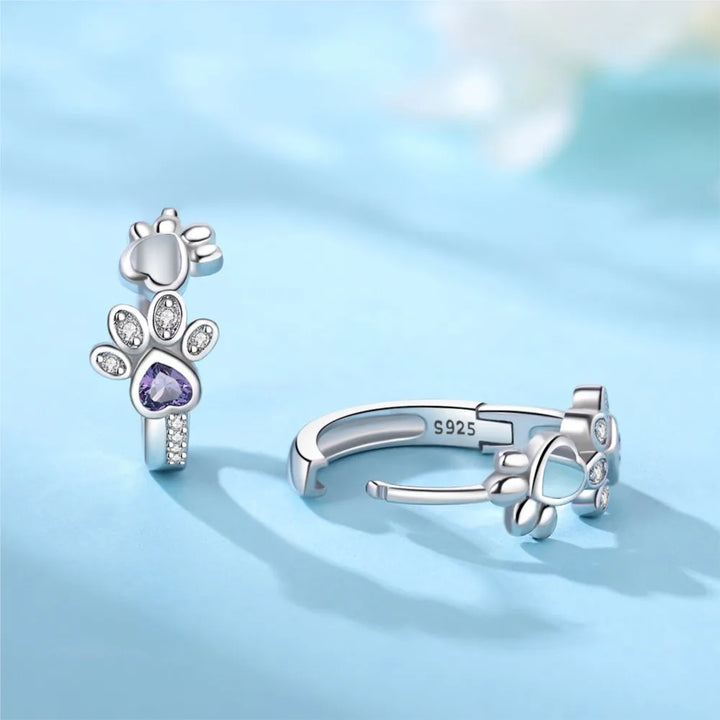 Paw Huggie silver earrings with cubic zirconia and heart-shaped gemstone