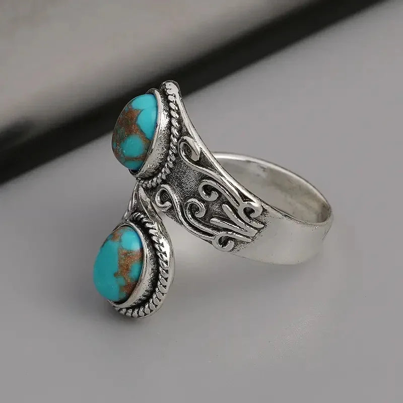 Elegante vintage turkooizen ring met kruisband