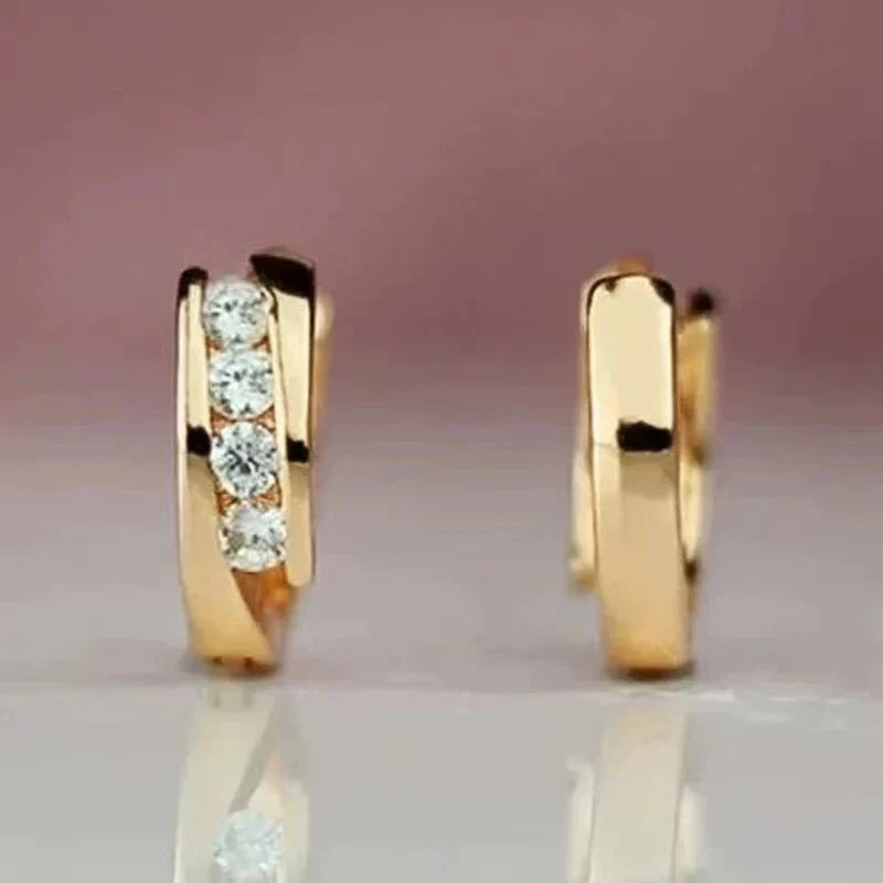 Goudkleurige elegante oorbellen met zirkonia