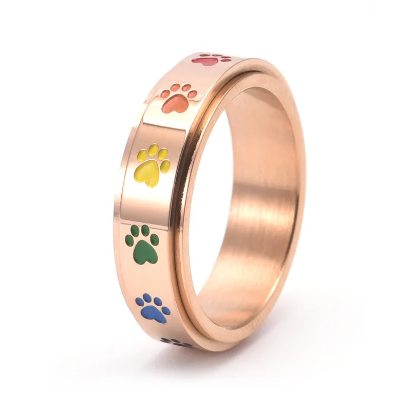 Thea - draaibare antistress-ring met regenboogpootjes