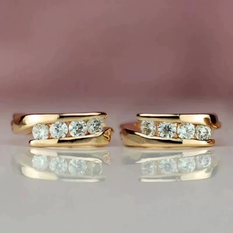 Goudkleurige elegante oorbellen met zirkonia