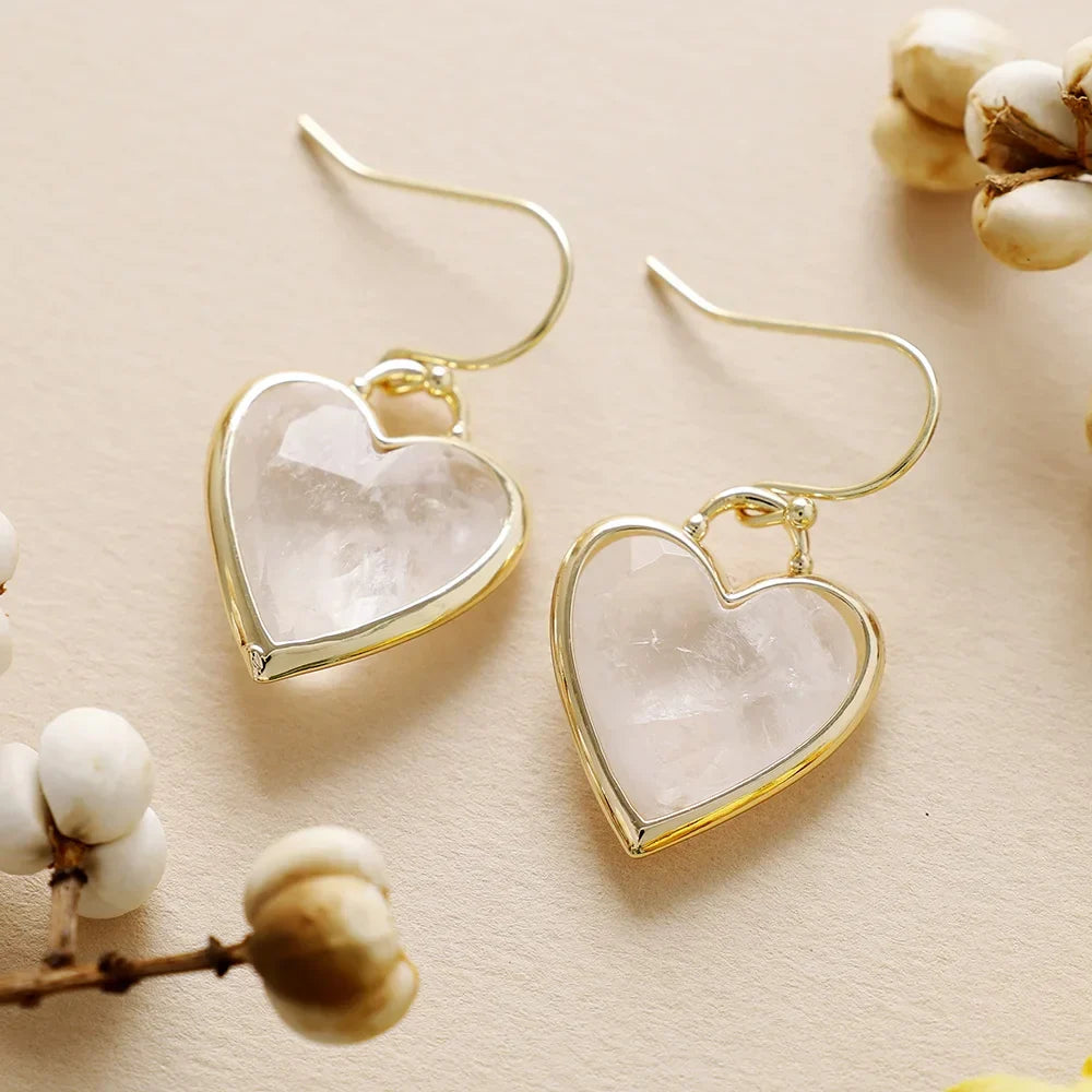 Elegante vergulde oorbellen met liefdesband