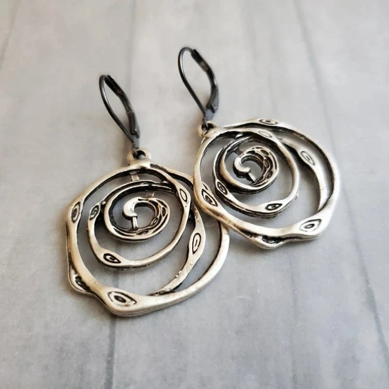 Sculpturale spiraal sterling zilveren oorhangers