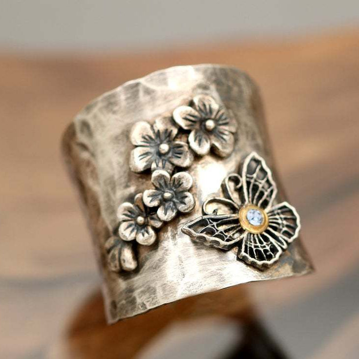 Vintage verzilverde ring met bloemdesign