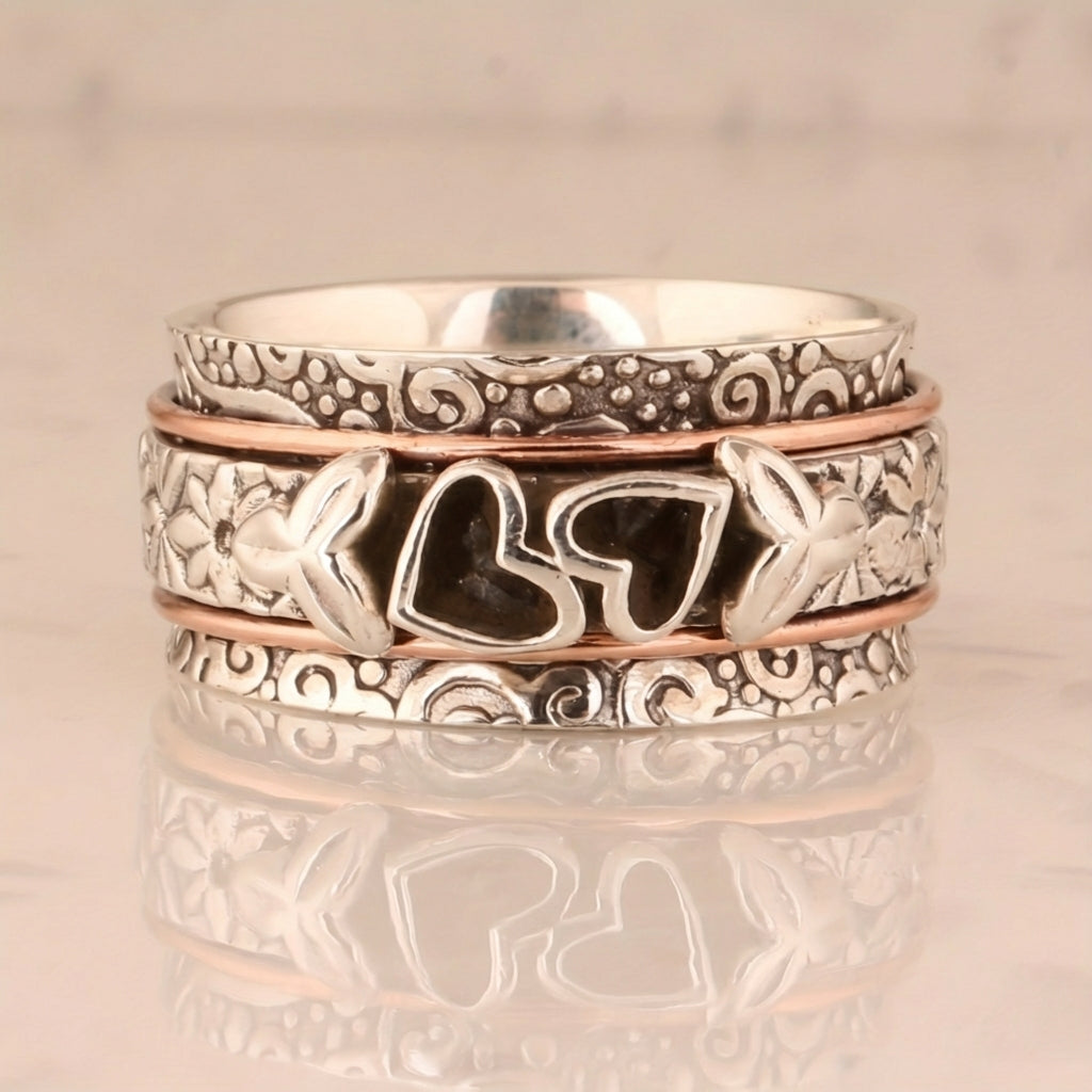 Vintage verzilverde spinner ring met vlinder en hart