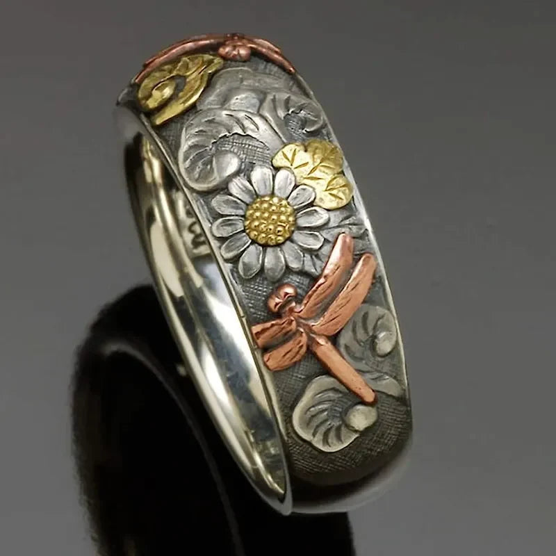 Vintage ring met zonnebloem en libel in gemengd metaal design