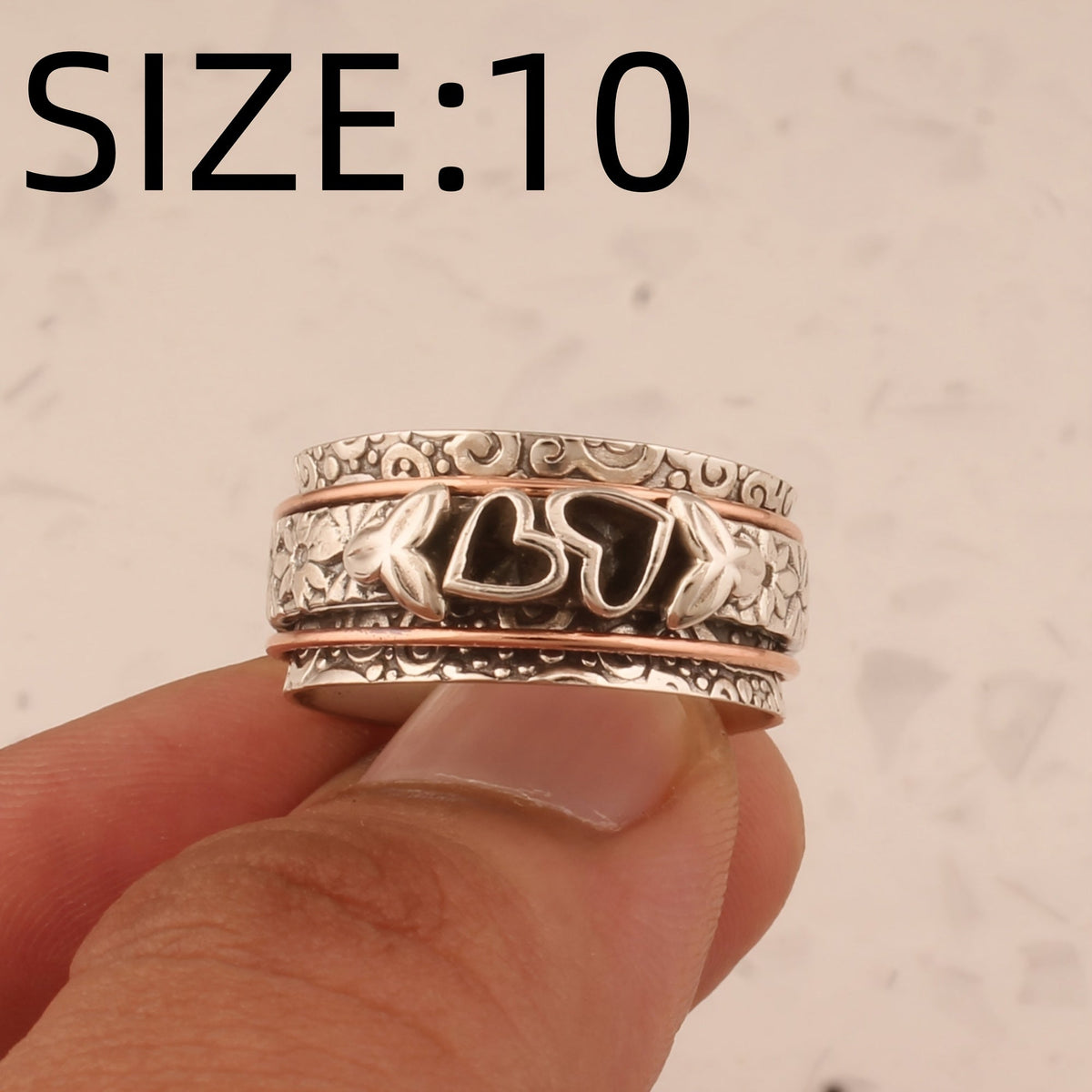 Vintage verzilverde spinner ring met vlinder en hart