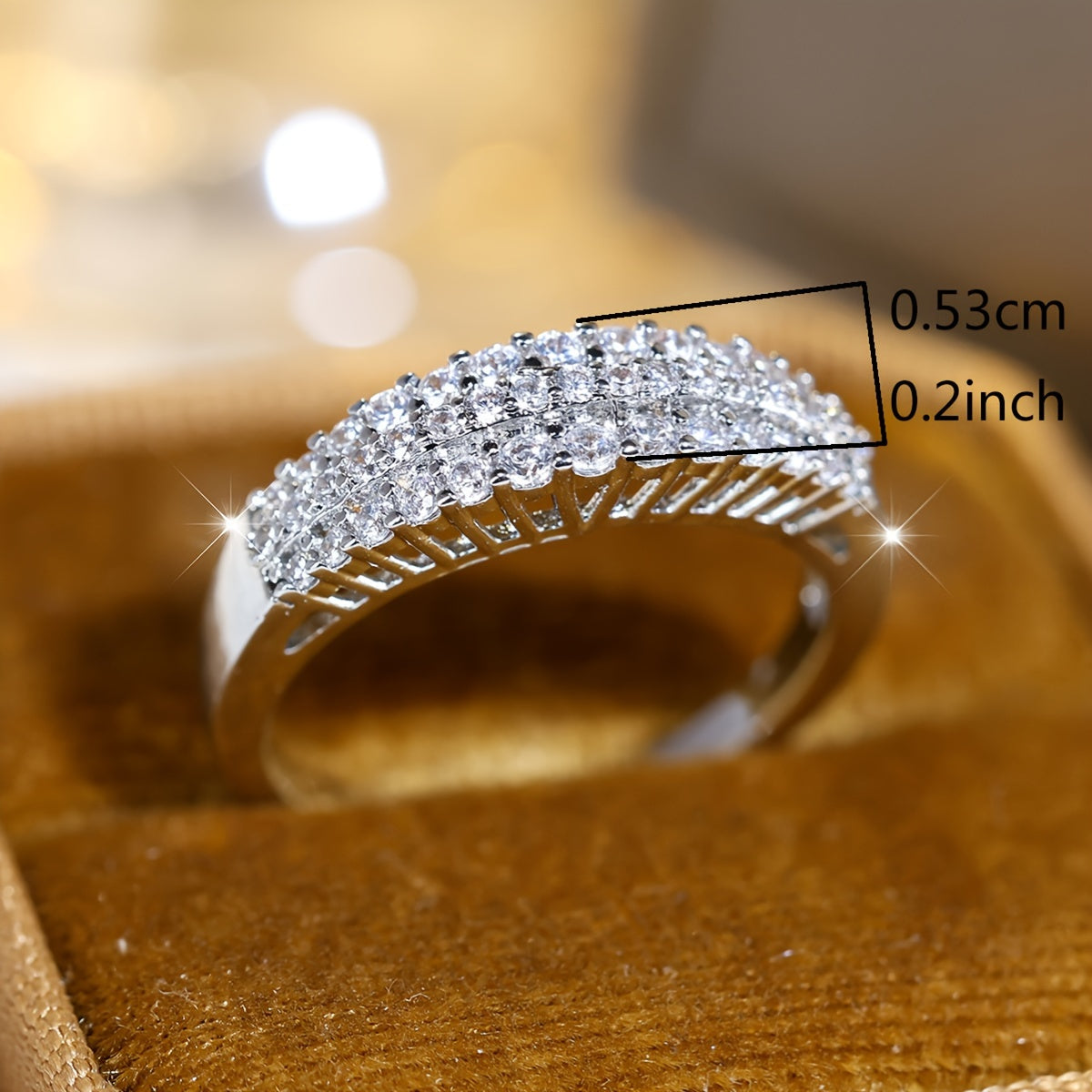Elegante verzilverde ring met drie rijen zirkonia