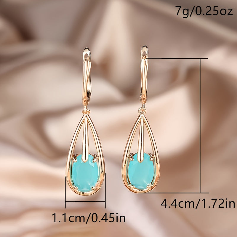 Elegante vergulde lange oorhangers met druppelvormige zirkonia