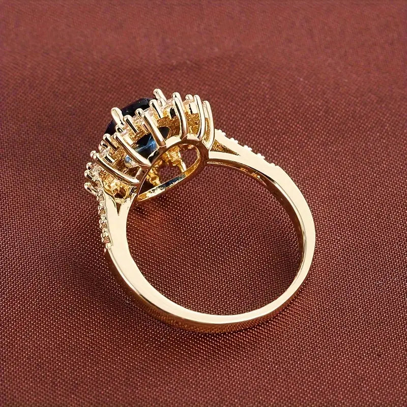 Vionne goudkleurige ring met saffier