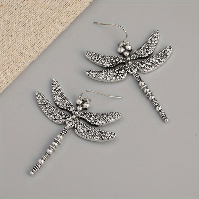 Elegante vintage oorhangers met libelle