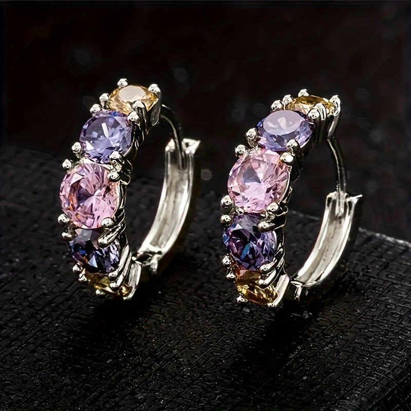 Elegante oorringen met kleurrijke zirkonia in vintage stijl