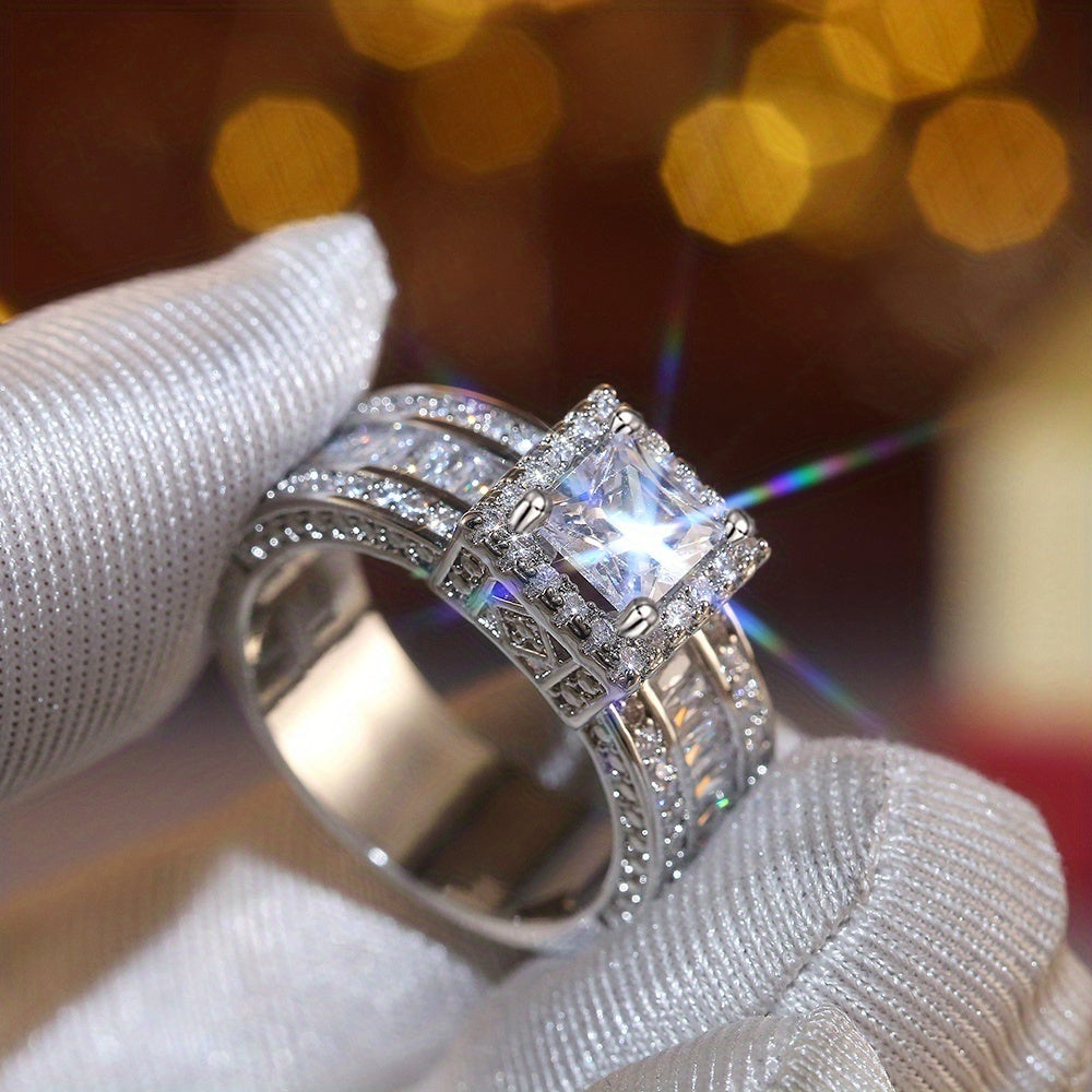 Elegante ring met vierkante zirkonia en radiant slijpsel