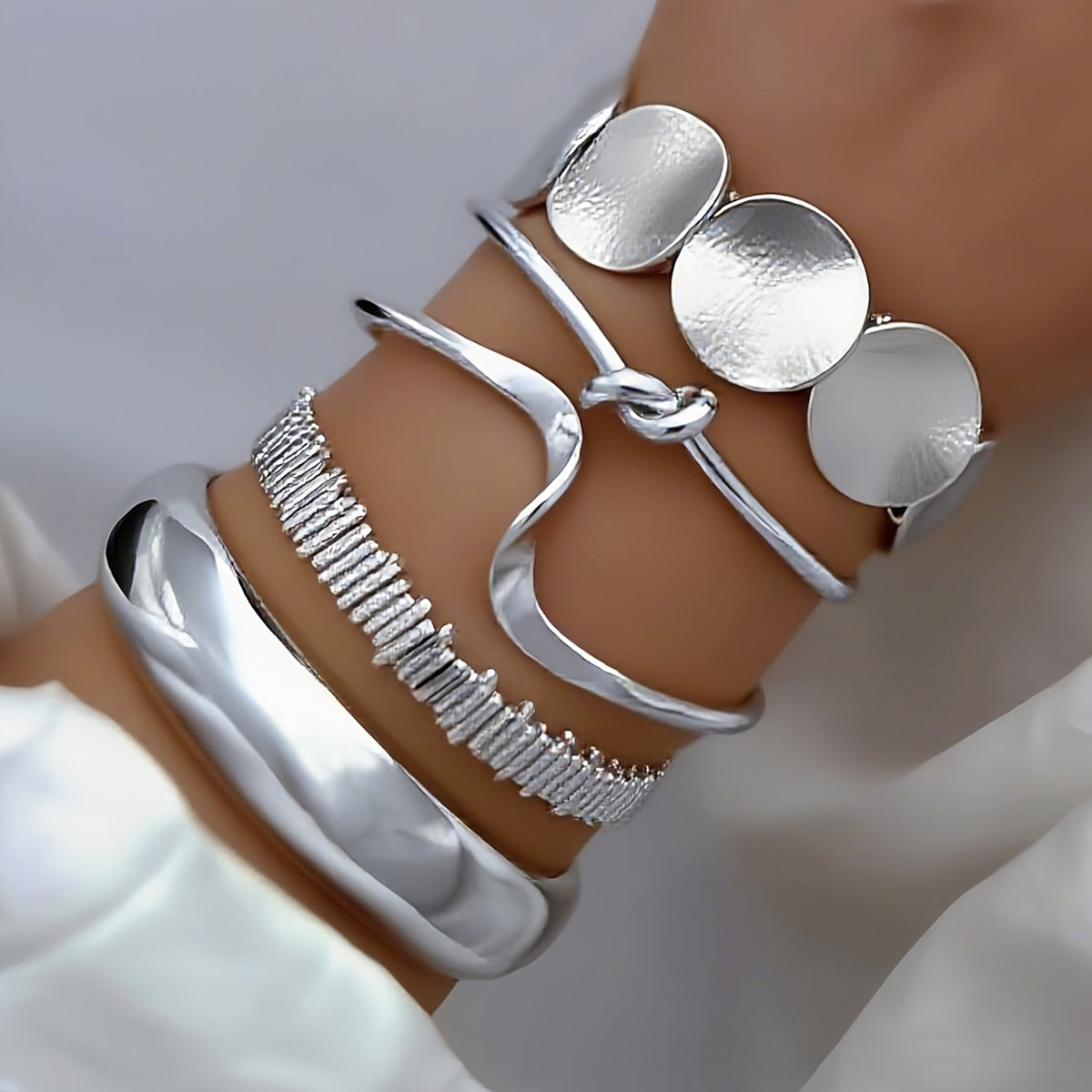 Vintage stapelbare verzilverde set slavenarmbanden