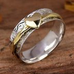 Vintage tweekleurige spinner ring met hartpatroon