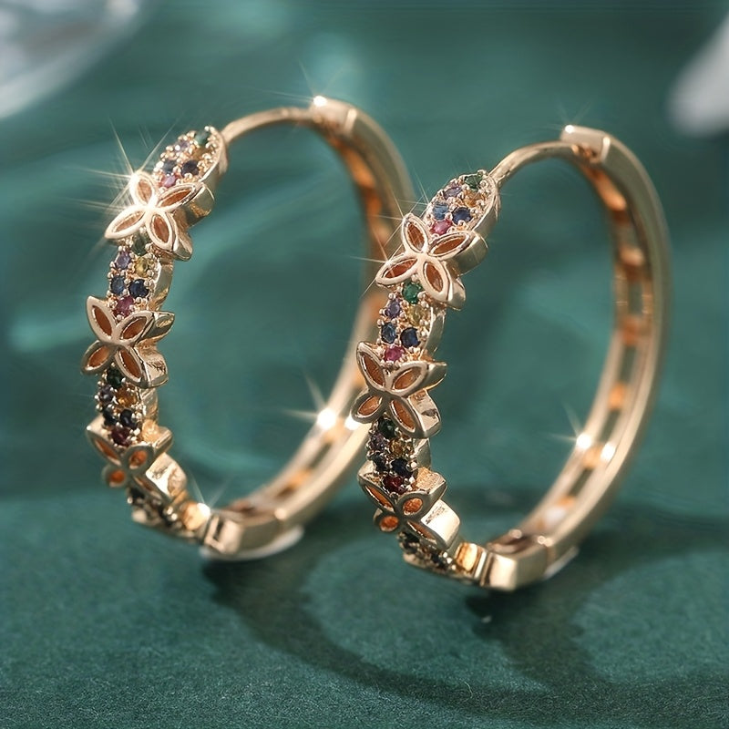 Elegante bohemien oorbellen met meerkleurige zirkonia bloem en vlinder