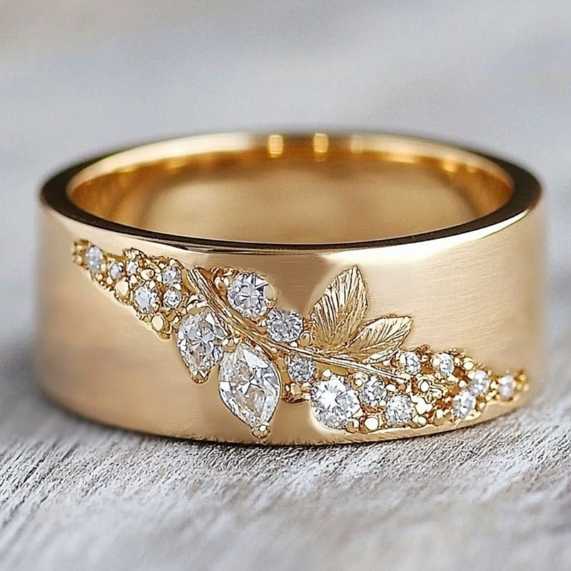 Vintage smaragdring met goudkleurige band