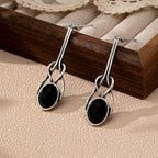 Vintage ambachtelijke oorhangers met rond glas en zinklegering