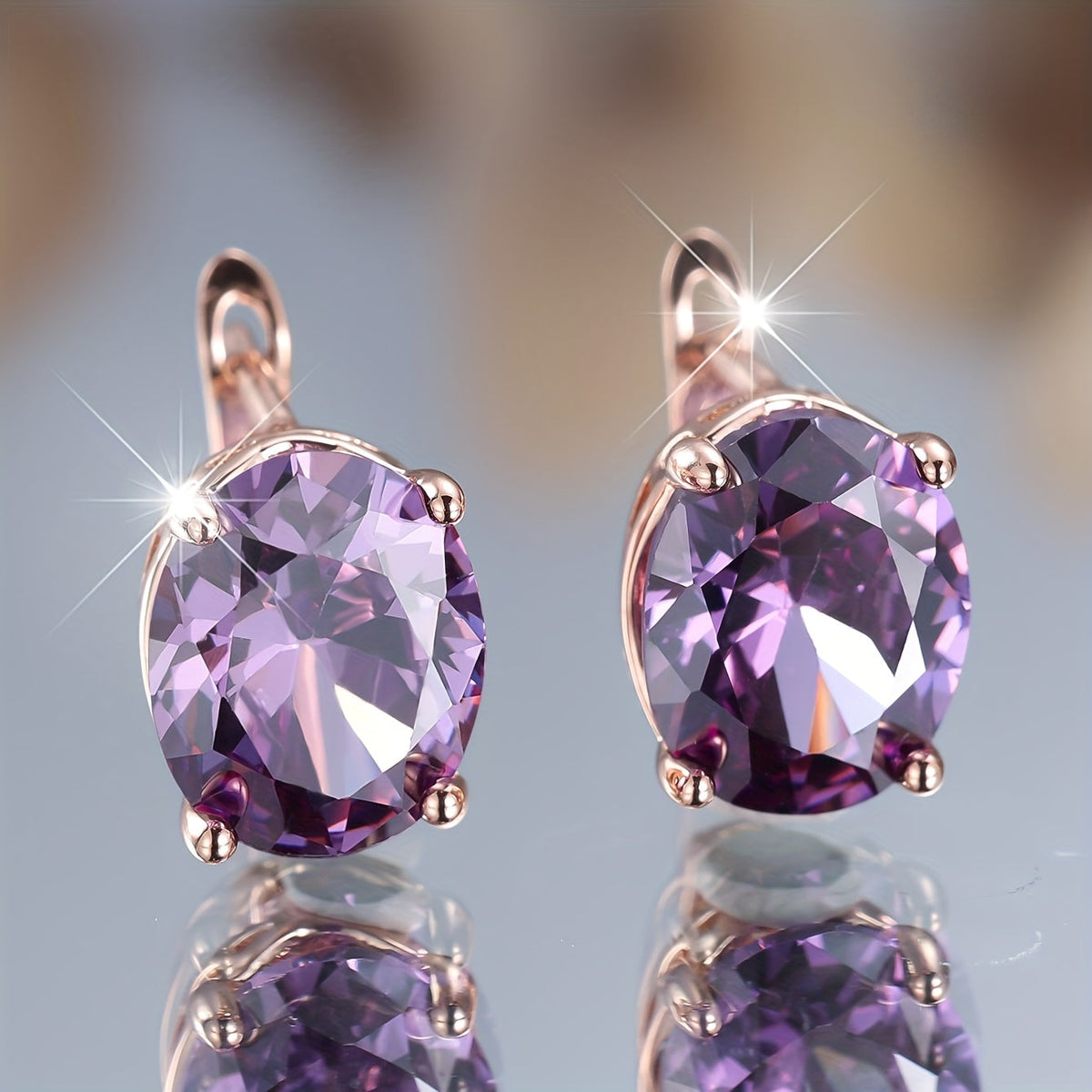 Elegante oorhangers met paarse zirkonia in boho stijl